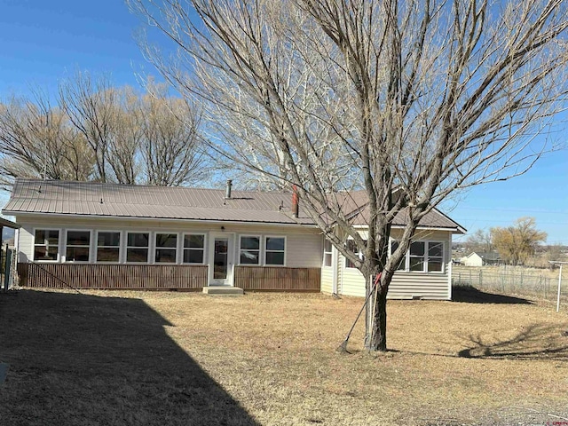 single story home with a front yard