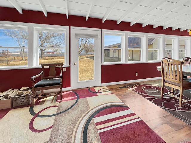 sunroom / solarium with beam ceiling