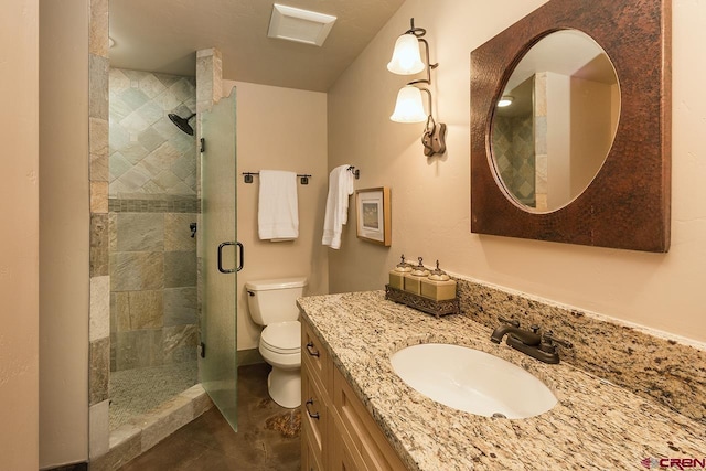 bathroom with vanity, tile patterned flooring, toilet, and walk in shower