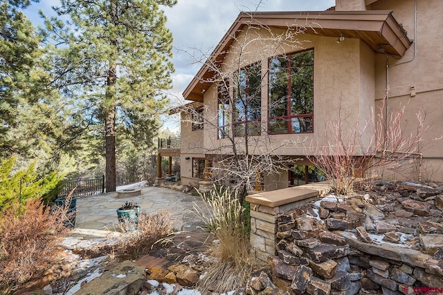 view of home's exterior with a patio