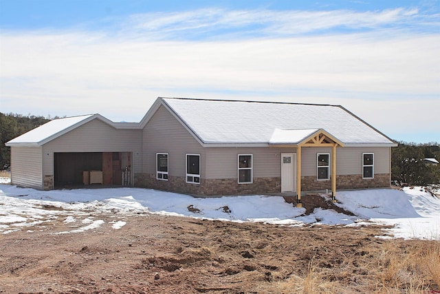 single story home with a garage