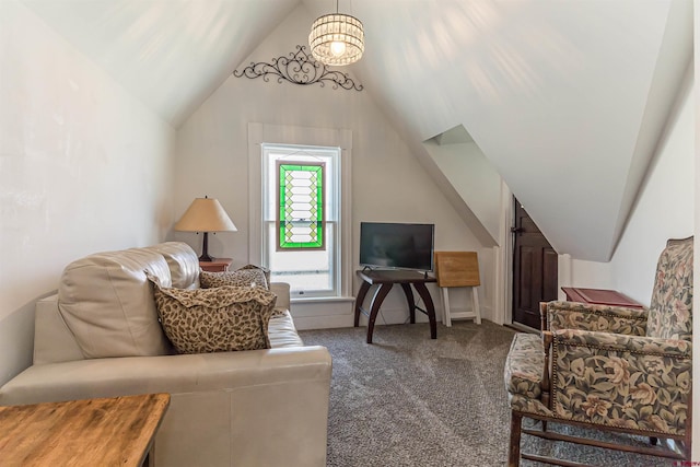 carpeted living room featuring vaulted ceiling