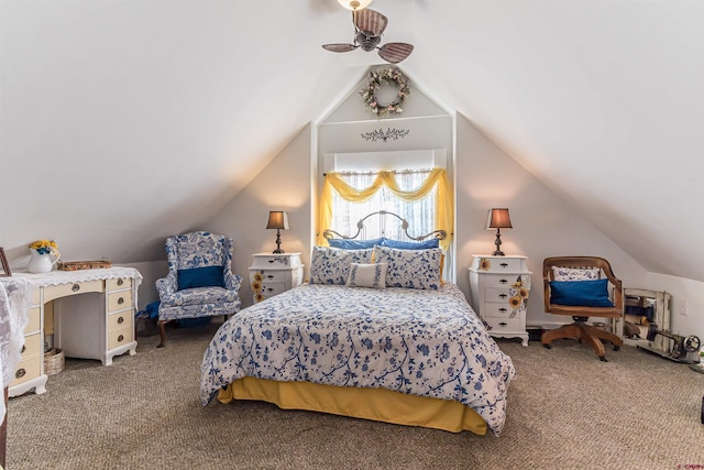 bedroom with lofted ceiling and carpet floors