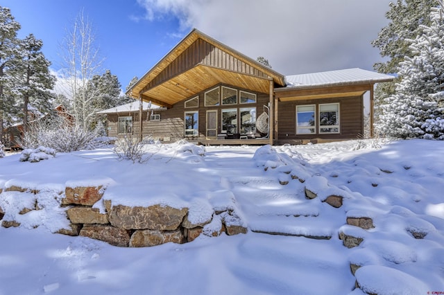 view of snow covered property