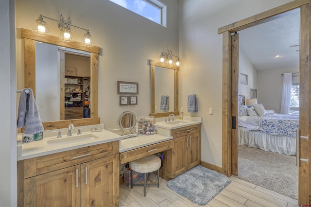 bathroom featuring vanity and hardwood / wood-style floors