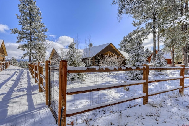 view of snow covered gate