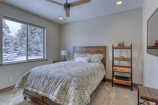 carpeted bedroom featuring ceiling fan