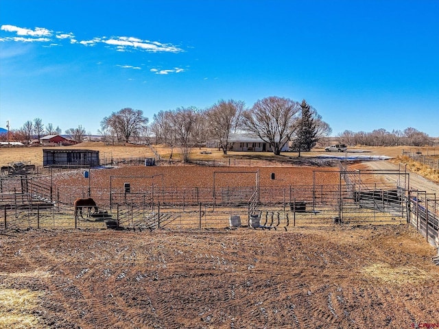 view of yard featuring a rural view