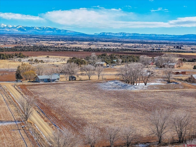 bird's eye view with a mountain view and a rural view