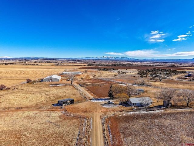 bird's eye view with a rural view and a mountain view