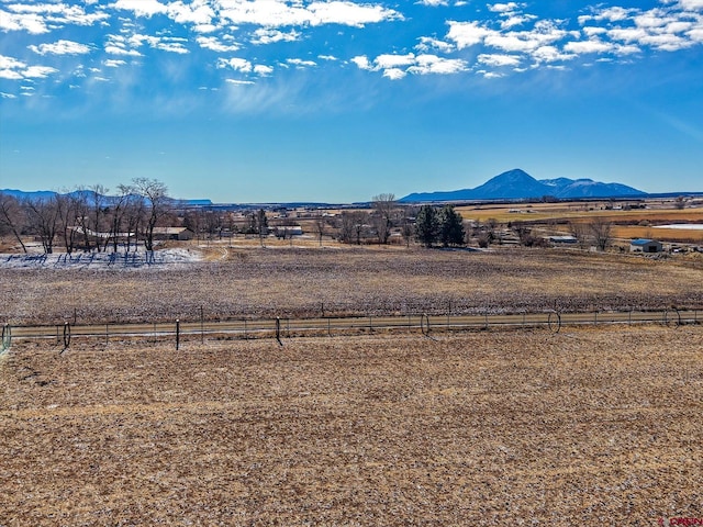 property view of mountains featuring a rural view