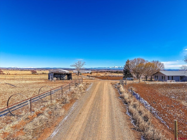 view of road with a rural view