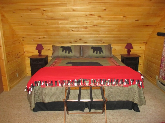 carpeted bedroom featuring wood ceiling, wooden walls, and vaulted ceiling