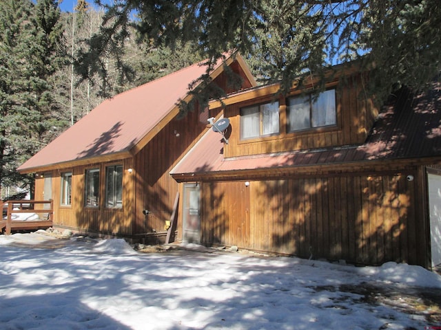 view of snow covered property