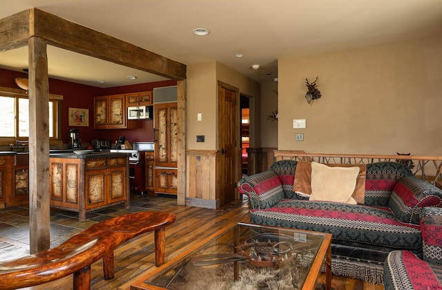 1294 County Road 734, Crested Butte, CO 81224 - living room with wainscoting, recessed lighting, and dark wood-style flooring