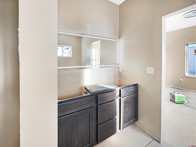 kitchen with dark brown cabinetry