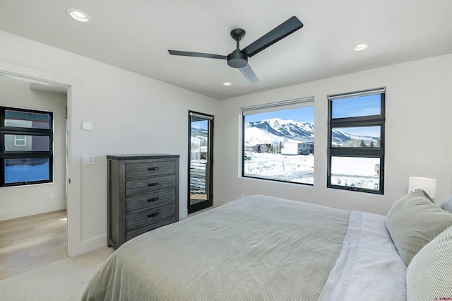 bedroom featuring access to exterior and ceiling fan