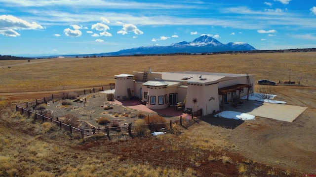 aerial view featuring a rural view and a mountain view