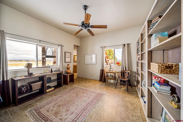 interior space featuring ceiling fan