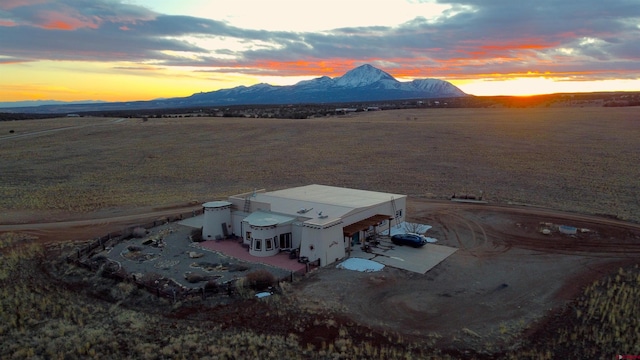 aerial view at dusk with a mountain view