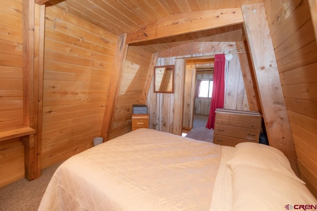1015 E Stollsteimer Rd, Pagosa Springs, CO 81147 - carpeted bedroom with lofted ceiling, wood walls, and wooden ceiling