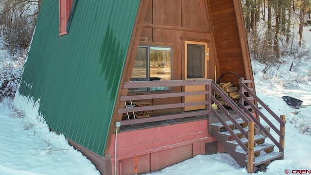 1015 E Stollsteimer Rd, Pagosa Springs, CO 81147 - snow covered property entrance featuring metal roof