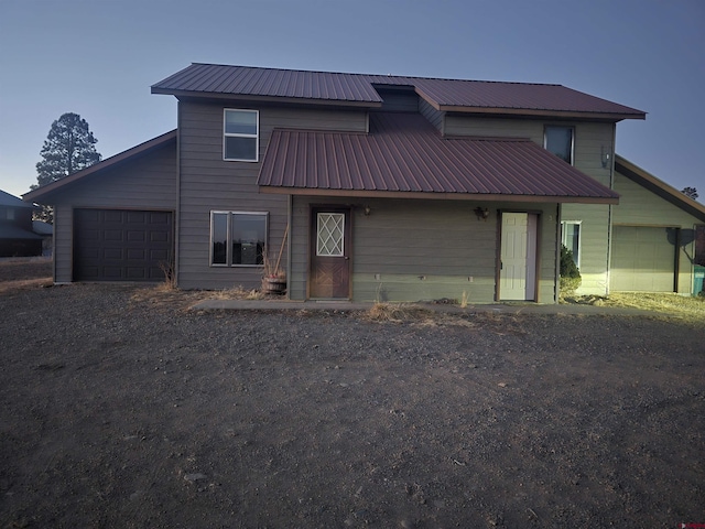 view of front of home with a garage