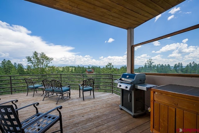 wooden deck with area for grilling