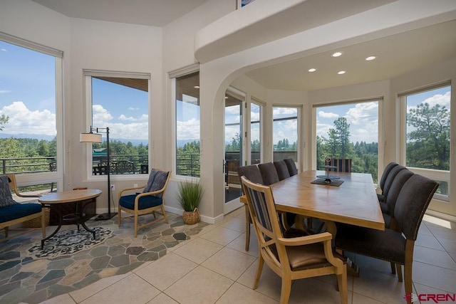 sunroom with plenty of natural light