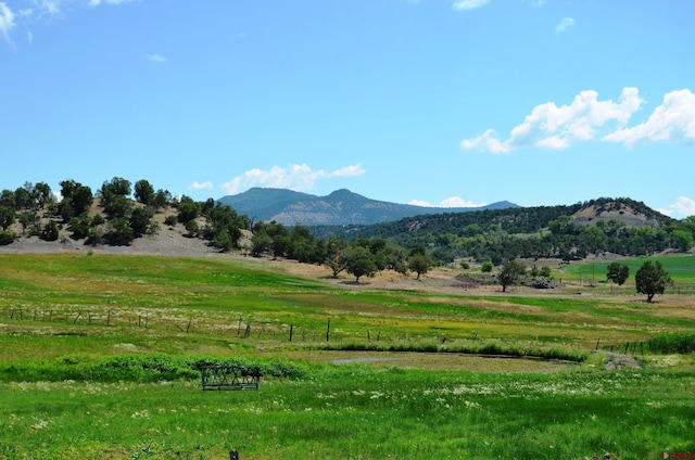 property view of mountains featuring a rural view