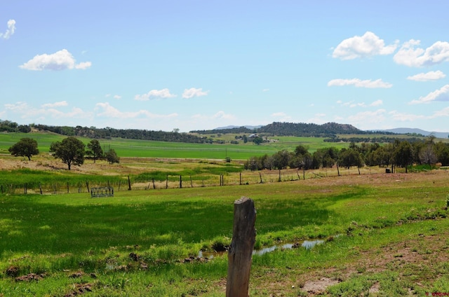 view of mountain feature with a rural view