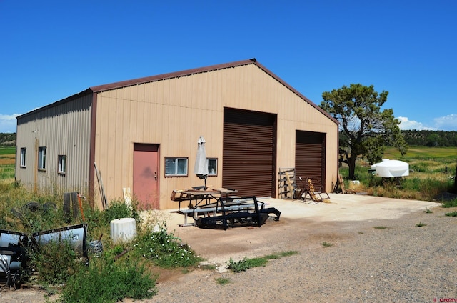 view of outbuilding featuring a garage