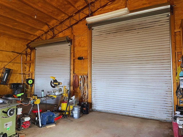 garage with a workshop area