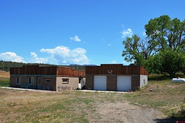 view of outbuilding with a garage