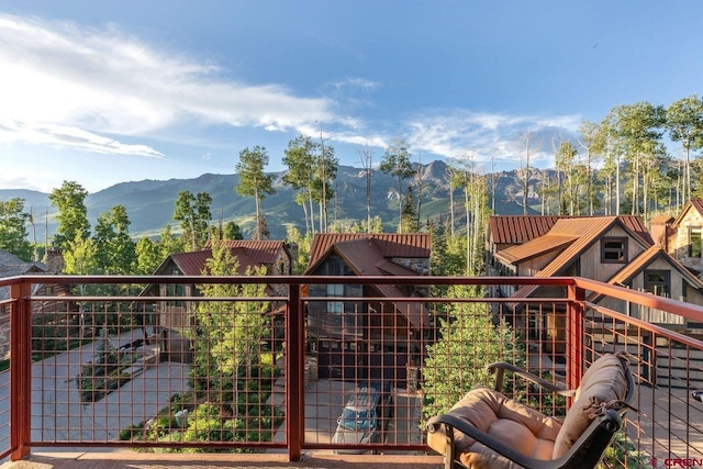 balcony featuring a mountain view