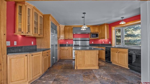 kitchen with pendant lighting, sink, wall chimney range hood, built in appliances, and a kitchen island