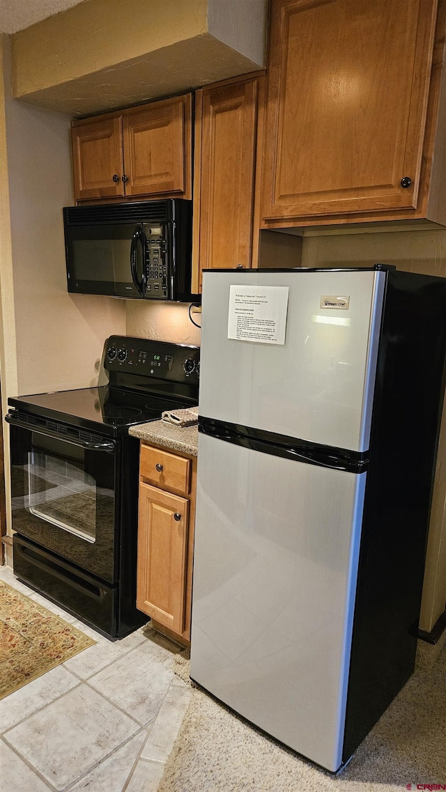 kitchen with black appliances