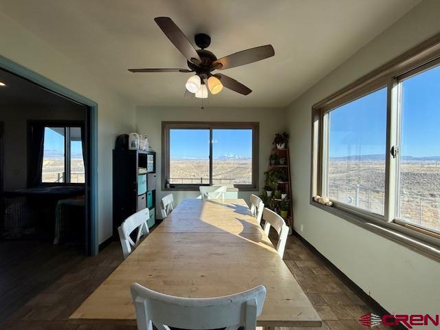 dining room featuring ceiling fan