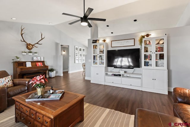 living room featuring ceiling fan, vaulted ceiling, and hardwood / wood-style floors