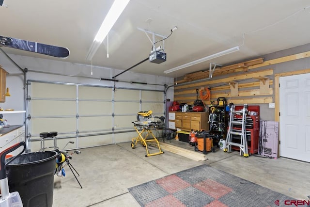 garage featuring a garage door opener