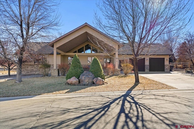 view of front of property with a garage