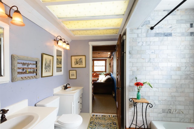 full bathroom featuring vanity, toilet, and tub / shower combination