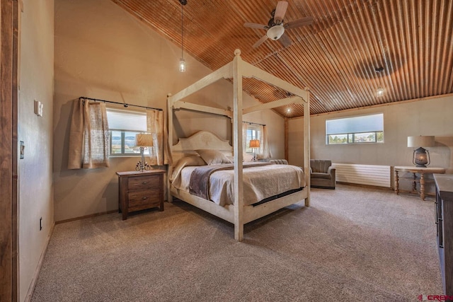 bedroom with high vaulted ceiling, light carpet, and wood ceiling