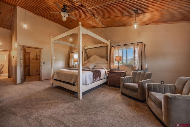 bedroom featuring wood ceiling, carpet flooring, and a high ceiling