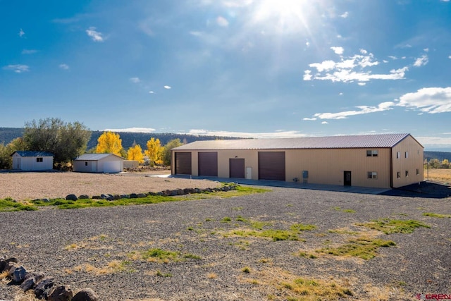 view of outdoor structure with a garage