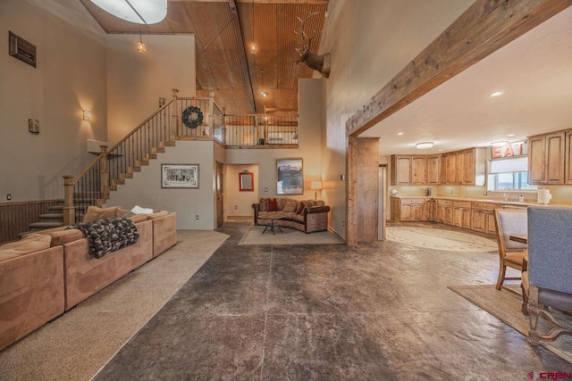 living room with a towering ceiling