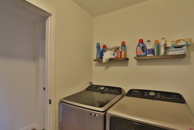 laundry room featuring washer and clothes dryer