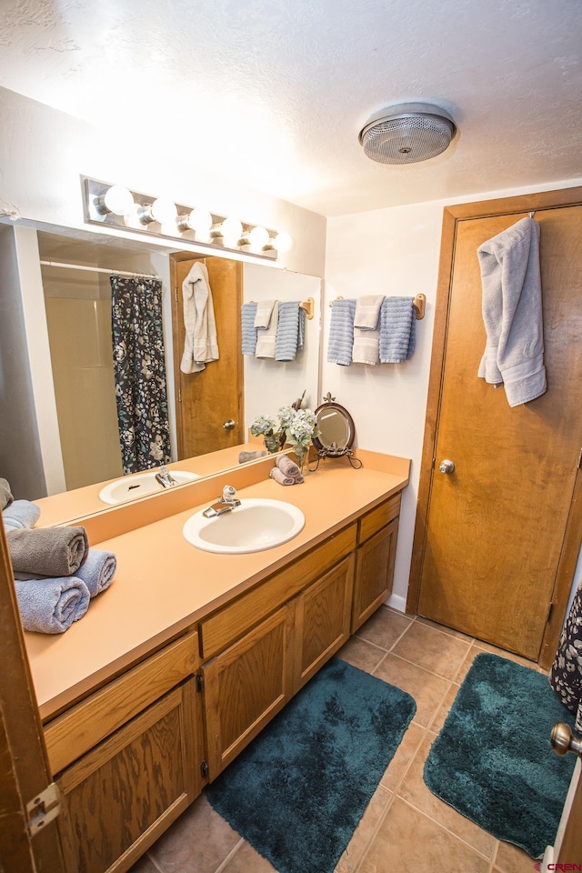 bathroom featuring vanity and tile patterned floors