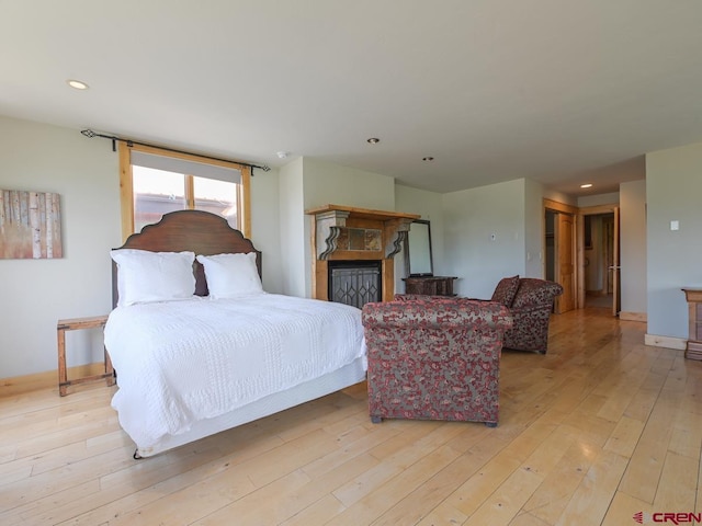 bedroom featuring light wood-type flooring