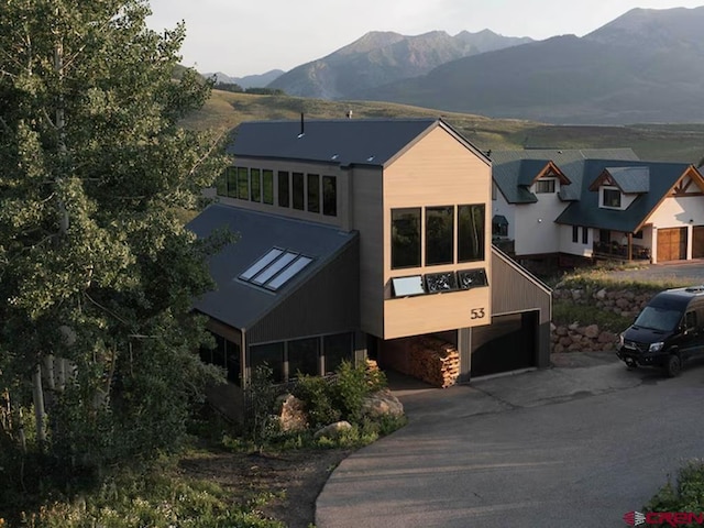 exterior space featuring a mountain view